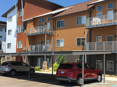 Flat top commercial carport for apartment building