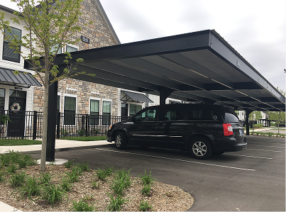 Modern flat top commercial carport outside of business